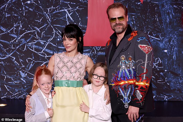 The actress added that she was already talking to her two daughters, Ethel, 13 and Marnie, 11, about sex and vowed to make sure they had no 'shame' about their first times (pictured with daughters and husband David in 2022)