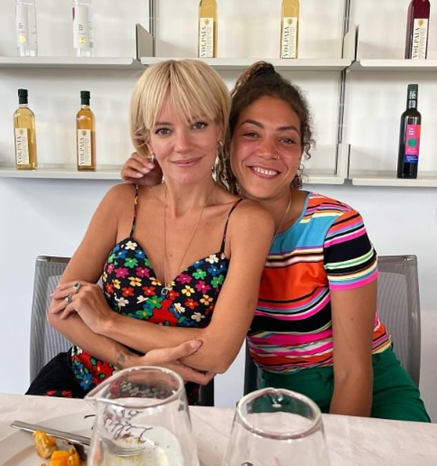The two women also confessed to some of their sexual escapades, with Lily revealing she had slept with a mystery TV star when she was 'very young' who had made a very embarrassing music choice (pictured with Miquita)