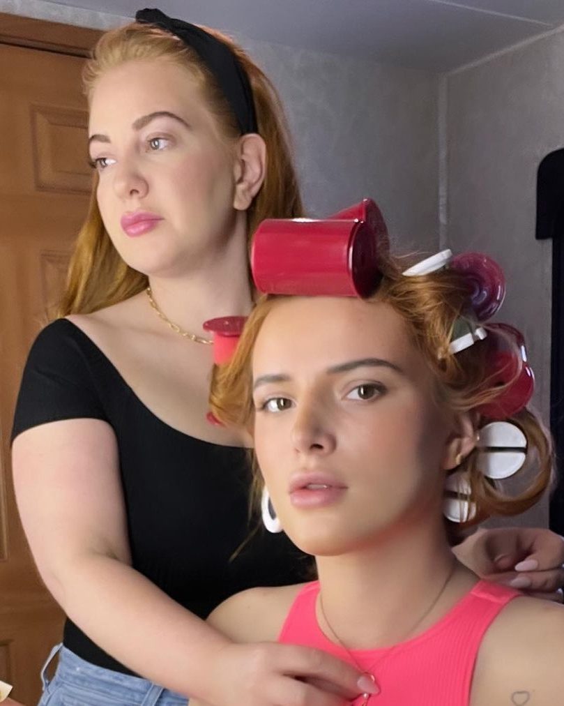 Angela Calisti and Bella Thorne with her hair in curlers