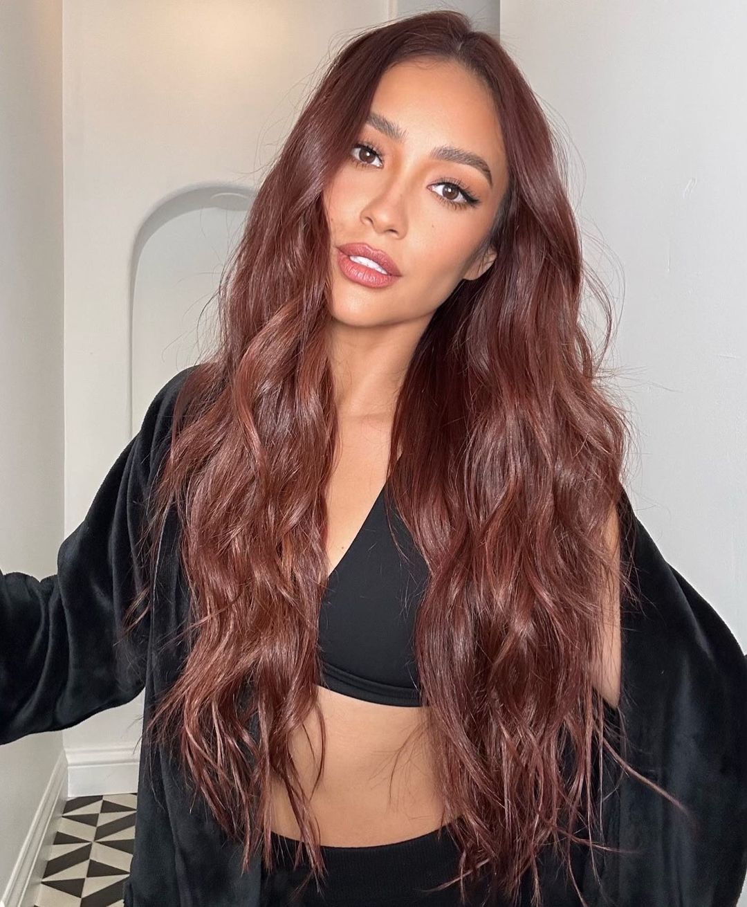 Shay Mitchell with long red hair