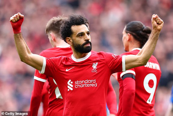 LIVERPOOL, ENGLAND - MARCH 31: Mohamed Salah of Liverpool celebrates scoring his side's second goal during the Premier League match between Liverpool FC and Brighton & Hove Albion at Anfield on March 31, 2024 in Liverpool, England. (Photo by Chris Brunskill/Fantasista/Getty Images)
