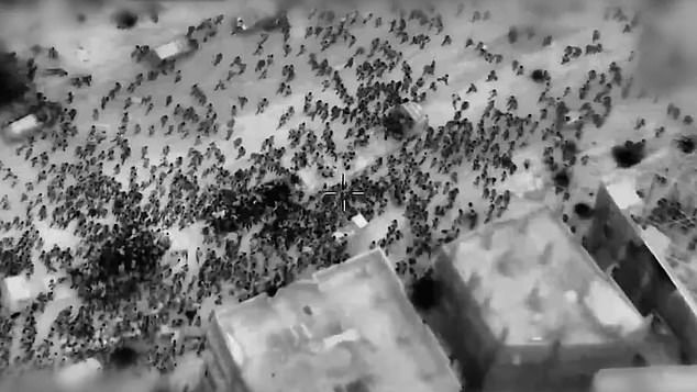 Above, a screen grab taken from an Israeli military video and released on February 29, showing Palestinians surround aid trucks in northern Gaza before Israeli troops fired on the crowd