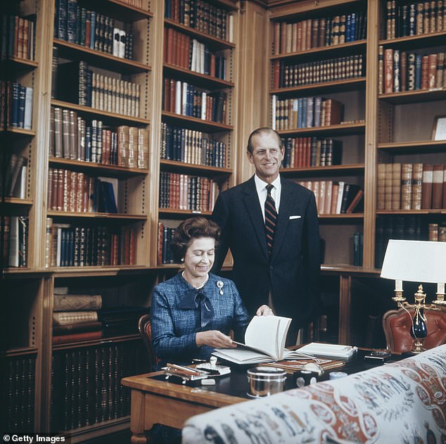 Queen Elizabeth and Prince Philip, the Duke of Edinburgh in the study at Balmoral Castle, Scotland, September 26, 1976