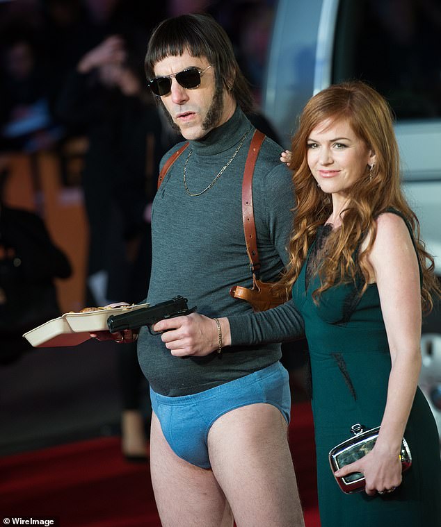 Sacha, dressed in character, and wife Isla attend the Grimsby world premiere in 2016