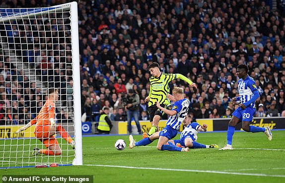 BRIGHTON, ENGLAND - APRIL 06: Kai Havertz of Arsenal scores his team's second goal during the Premier League match between Brighton & Hove Albion and Arsenal FC at American Express Community Stadium on April 06, 2024 in Brighton, England. (Photo by David Price/Arsenal FC via Getty Images)