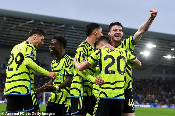 BRIGHTON, ENGLAND - APRIL 06: Kai Havertz of Arsenal celebrates scoring his team's second goal with teammates during the Premier League match between Brighton & Hove Albion and Arsenal FC at American Express Community Stadium on April 06, 2024 in Brighton, England. (Photo by Stuart MacFarlane/Arsenal FC via Getty Images)