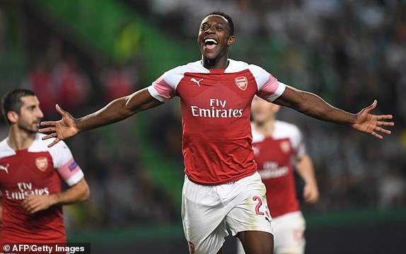(FILES) In this file photo taken on October 25, 2018 Arsenal's English striker Danny Welbeck celebrates after scoring a goal during the UEFA Europa League group E football match Sporting CP vs Arsenal FC at the Alvalade stadium in Lisbon. - Arsenal forward Danny Welbeck has left the club at the end of his contract along with veteran goalkeeper Petr Cech and experienced defender Stephan Lichtsteiner. (Photo by Francisco LEONG / AFP)FRANCISCO LEONG/AFP/Getty Images
