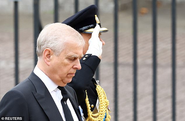 As other members of the royal family, in military attire, saluted the Queen outside Westminster Abbey, Prince Andrew bowed his head in tribute to his beloved mother