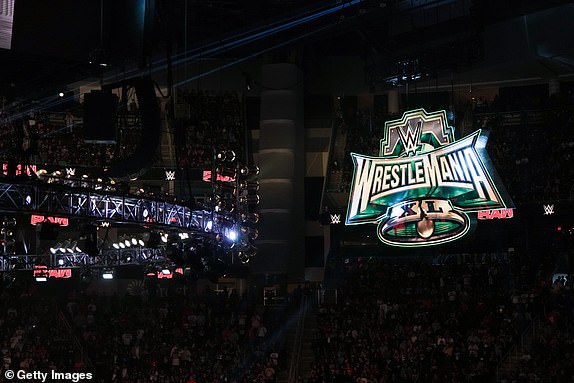 HOUSTON, TEXAS - MARCH 11: A Wrestlemania sign is seen in the rafters during WWE Monday Night RAW at Toyota Center on March 11, 2024 in Houston, Texas. (Photo by Alex Bierens de Haan/Getty Images)