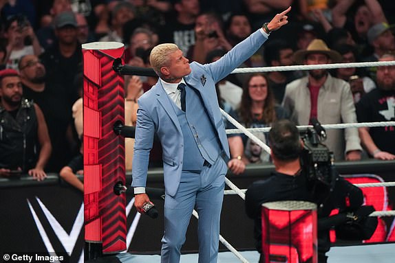 HOUSTON, TEXAS - MARCH 11: Cody Rhodes points to the Wrestlemania banner during WWE Monday Night RAW at Toyota Center on March 11, 2024 in Houston, Texas. (Photo by Alex Bierens de Haan/Getty Images)