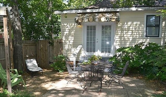 Hayward Garden Cottage in Arkansas features a courtyard garden for some eclipse viewing