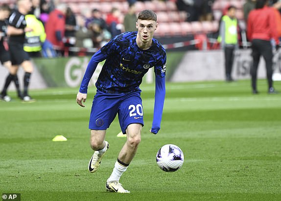 Chelsea's Cole Palmer warms up prior to the English Premier League soccer match between Sheffield United and Chelsea at Bramall Lane stadium in Sheffield, England, Sunday, April 7, 2024. (AP Photo/Rui Vieira)