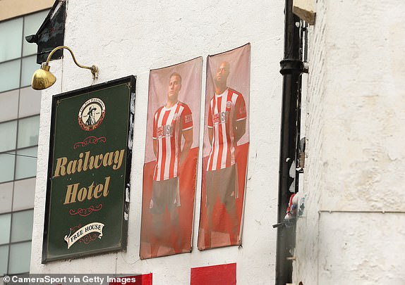 SHEFFIELD, ENGLAND - APRIL 7: A view of Sheffield United player portraits displayed on The Railway Inn pub on Bramall Lane, home of Sheffield United, ahead of the Premier League match between Sheffield United and Chelsea FC at Bramall Lane on April 7, 2024 in Sheffield, England.(Photo by Rich Linley - CameraSport via Getty Images)