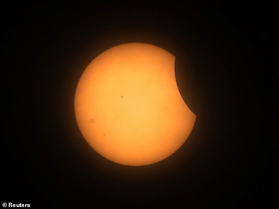 A partial solar eclipse is seen from Mazatlan, Mexico April 8, 2024. REUTERS/Henry Romero