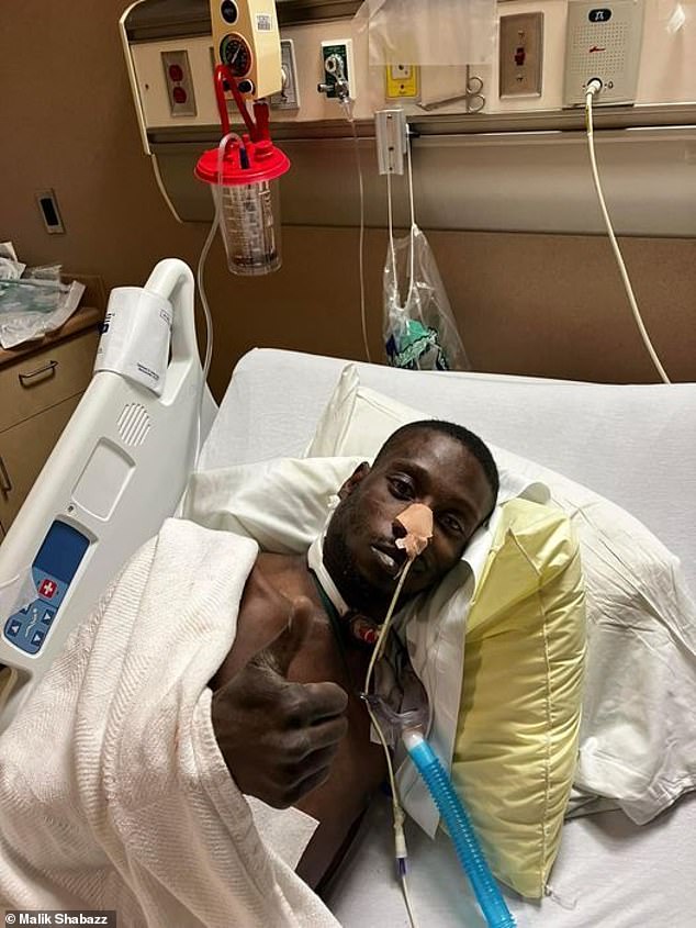 Michael Corey Jenkins im Krankenhaus, nachdem ihm während des Angriffs in den Mund geschossen wurde