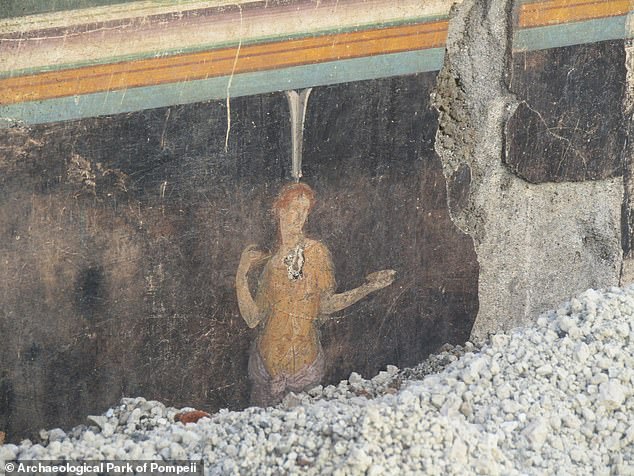 A fourth fresco, freshly uncovered from the ancient volcanic material, shows a female figure appearing to hold a dish