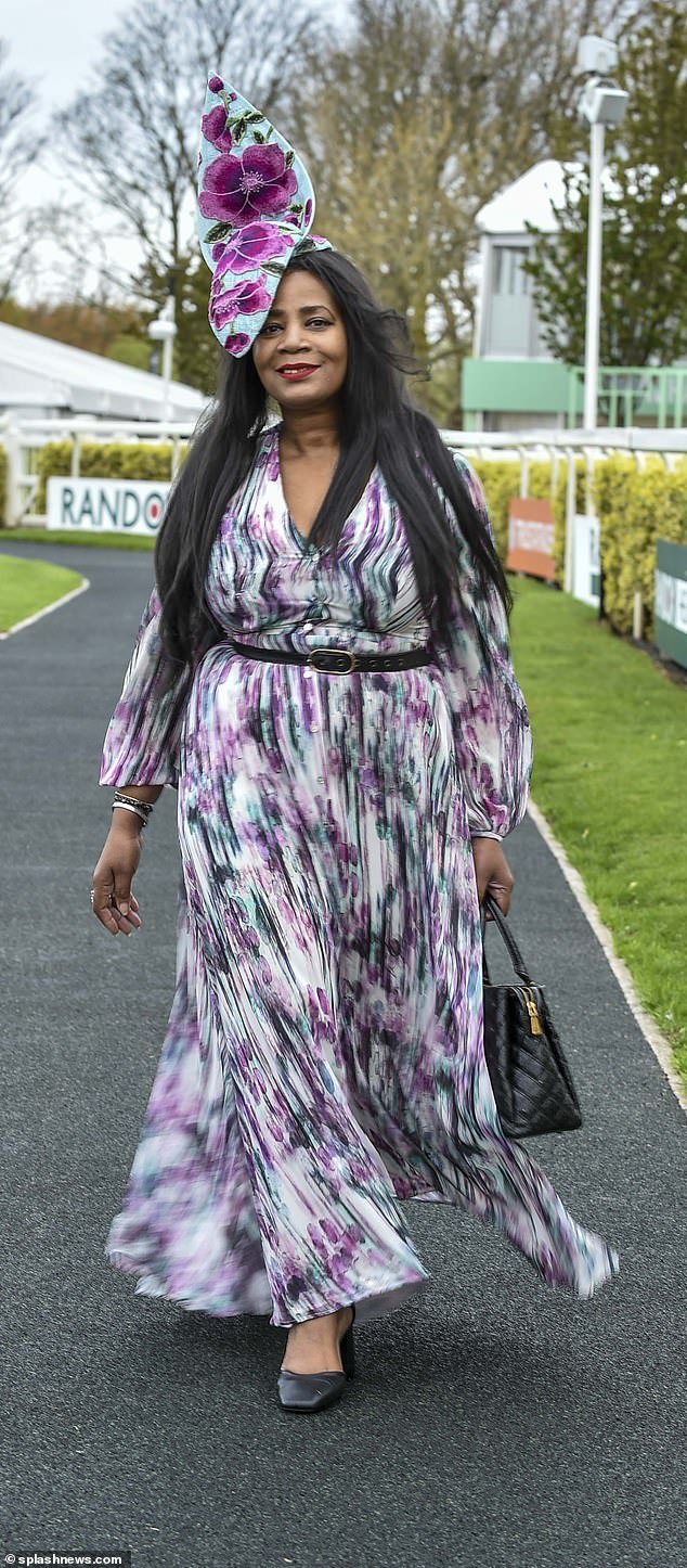 In another ode to the natural world, a reveller arrived wearing a multicoloured flowing maxi dress