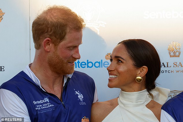 The Sussexes looked very much in love as they marked Harry's triumphant victory
