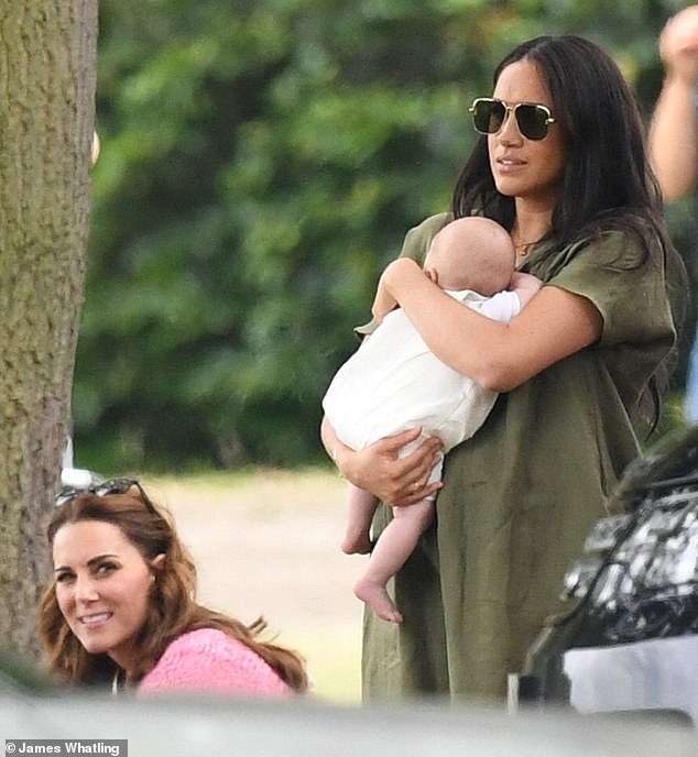 Kate made an awkward joint appearance alongside Meghan to watch William and Harry play in 2019 (pictured)