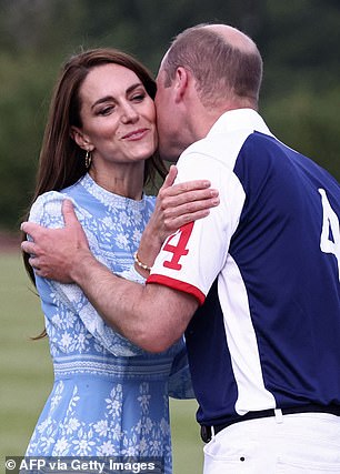 William plants a kiss on his wife's right cheek