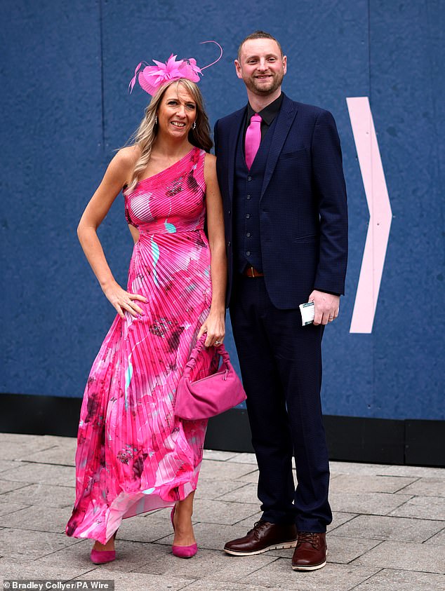 Pink and perfect! One couple were sure to coordinate a pleated asymmetric dress and fuchsia tie