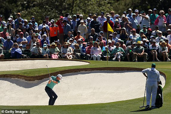 AUGUSTA, GEORGIA - APRIL 13: J.T. Poston of the United States plays his shot from the bunker on the seventh hole during the third round of the 2024 Masters Tournament at Augusta National Golf Club on April 13, 2024 in Augusta, Georgia. (Photo by Jamie Squire/Getty Images) (Photo by Jamie Squire/Getty Images)