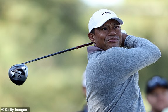AUGUSTA, GEORGIA - APRIL 12: Tiger Woods of the United States plays his shot from the 18th tee during the continuation of the first round of the 2024 Masters Tournament at Augusta National Golf Club on April 12, 2024 in Augusta, Georgia. (Photo by Warren Little/Getty Images)