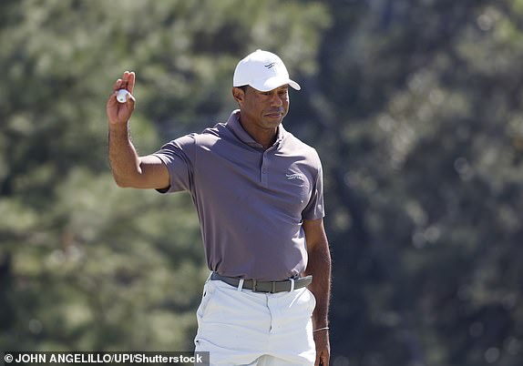 Mandatory Credit: Photo by John Angelillo/UPI/Shutterstock (14432662al) Tiger Woods waves as he walks off the eighteenth green during the second round of the Masters Tournament at Augusta National Golf Club in Augusta, Georgia on Friday, April 12, 2024. Woods finished the day at one-over-par. Masters Golf, Augusta, Georgia, United States - 12 Apr 2024