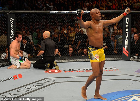 LAS VEGAS, NV - JULY 7:   Anderson Silva reacts after knocking out Chael Sonnen during their UFC middleweight championship bout at UFC 148 inside MGM Grand Garden Arena on July 7, 2012 in Las Vegas, Nevada.  (Photo by Donald Miralle/Zuffa LLC/Zuffa LLC via Getty Images)