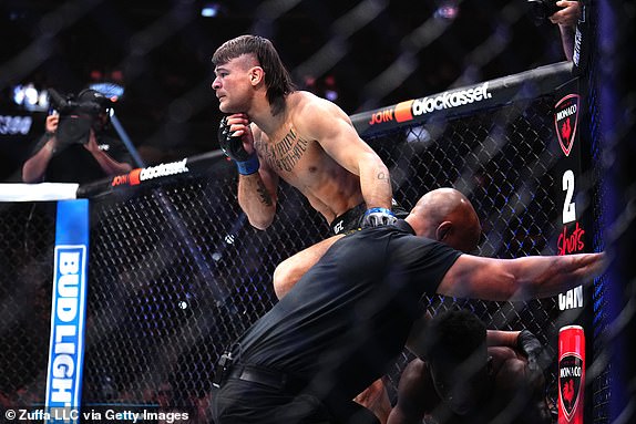 LAS VEGAS, NEVADA - APRIL 13: Diego Lopes of Brazil reacts to his win in a featherweight fight during the UFC 300 event at T-Mobile Arena on April 13, 2024 in Las Vegas, Nevada.  (Photo by Chris Unger/Zuffa LLC via Getty Images)