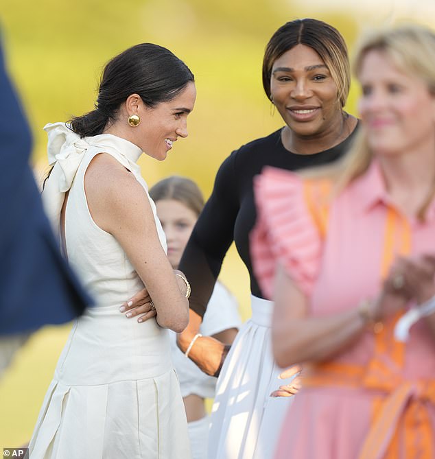 The two women were seen mingling with guests - while Serena enjoyed a glass of champagne