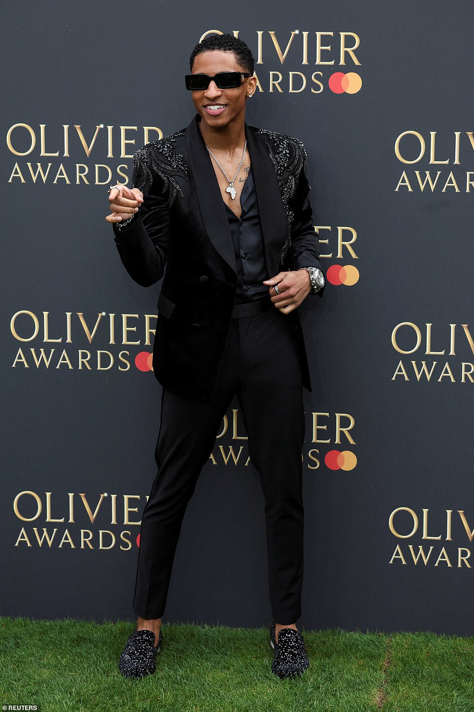 Myles Frost caught the eye in a black velvet jacket with beaded detailing over a silk shirt, which he left partially unbuttoned, and sported sunglasses