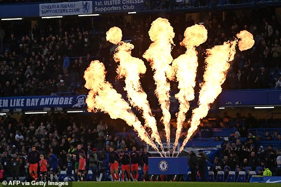 Pyrotechnics as the teams walk out for the English Premier League football match between Chelsea and Everton at Stamford Bridge in London on April 15, 2024. (Photo by Glyn KIRK / AFP) / RESTRICTED TO EDITORIAL USE. No use with unauthorized audio, video, data, fixture lists, club/league logos or 'live' services. Online in-match use limited to 120 images. An additional 40 images may be used in extra time. No video emulation. Social media in-match use limited to 120 images. An additional 40 images may be used in extra time. No use in betting publications, games or single club/league/player publications. /  (Photo by GLYN KIRK/AFP via Getty Images)