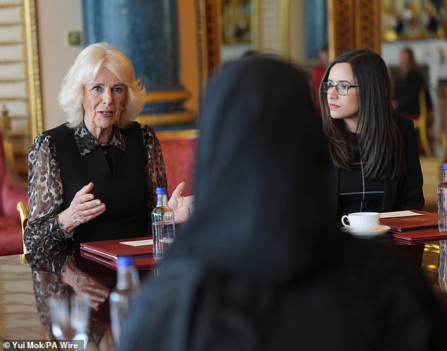'You're virtually the same age as my granddaughters and I was talking to one the other day and I was suggesting to take sort of pop-up shops into these schools,' the Queen (pictured left) told the Changemakers