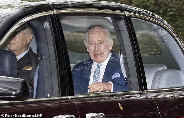 King Charles cheerfully waved to royal fans and tourists today as he left Clarence House this morning
