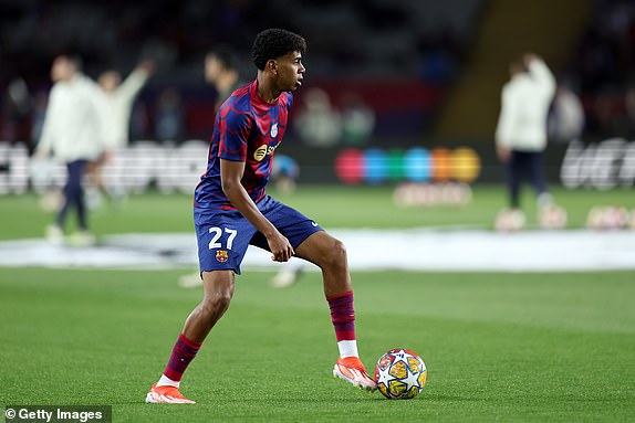 BARCELONA, SPAIN - APRIL 16: Lamine Yamal of FC Barcelona warms up prior to the UEFA Champions League quarter-final second leg match between FC Barcelona and Paris Saint-Germain at Estadi Olimpic Lluis Companys on April 16, 2024 in Barcelona, Spain. (Photo by Clive Brunskill/Getty Images)