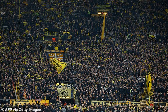 Dortmund fans cheer prior to the UEFA Champions League quarter-final second leg football match between Borussia Dortmund and Atletico Madrid in Dortmund, western Germany on April 16, 2024. (Photo by Odd ANDERSEN / AFP) (Photo by ODD ANDERSEN/AFP via Getty Images)