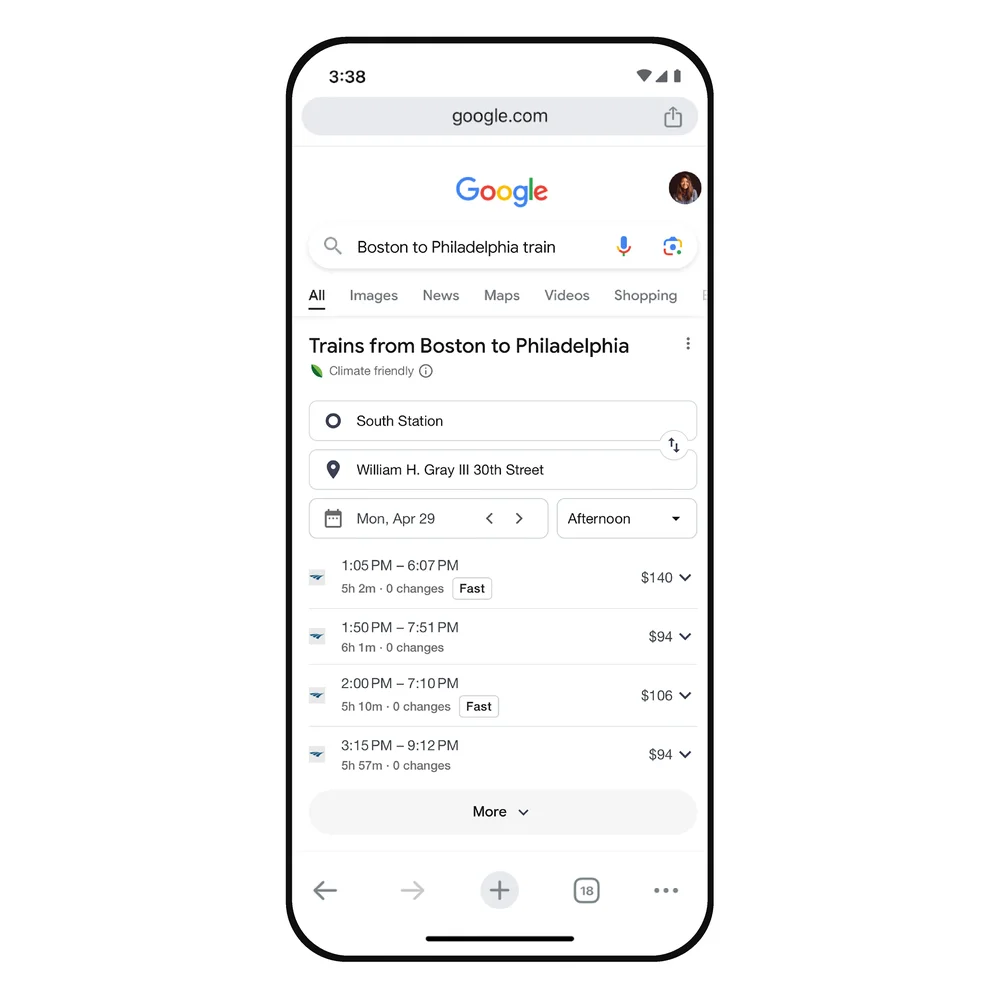 Ein Smartphone mit einer Google-Suche nach umweltfreundlicheren Reiseoptionen für Bahntickets von Boston nach Philadelphia, wobei mehrere Reiseoptionen nach Zeit und Preis aufgelistet sind.