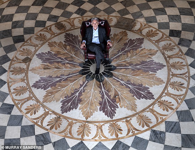 The Daily Mail's Mark Palmer sits in the massive, square Marble Saloon. This perfectly symmetrical room has a wrap-around gallery supported by ionic pillars