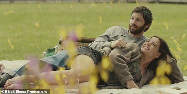 Suri sang in the film trailer for Alone Together, a romantic comedy directed by and starring her mother Katie Holmes (pictured with Jim Sturgess in the film)
