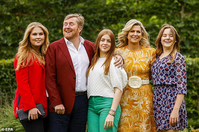 Willem-Alexander (2L), Queen Maxima (2R), Princess Amalia (L), Princess Alexia (C) and Princess Ariane are pictured during the summer photo session at Huis ten Bosch Palace in The Hague, The Netherlands, 2021