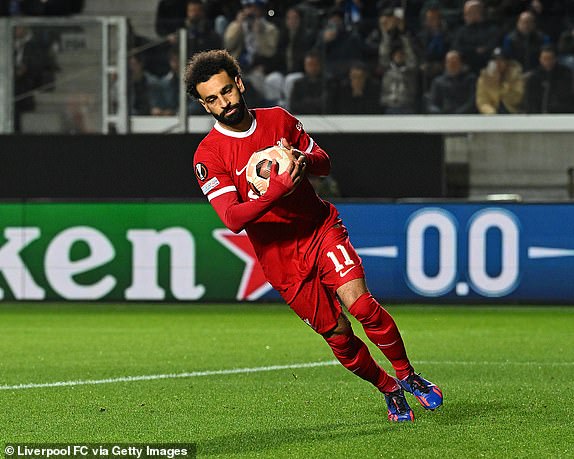 BERGAMO, ITALY - APRIL 18: (THE SUN OUT. THE SUN ON SUNDAY OUT) Mohamed Salah of Liverpool celebrates after scoring the opening goal during the UEFA Europa League 2023/24 Quarter-Final second leg match between Atalanta and Liverpool FC at Stadio Atleti Azzurri d'Italia on April 18, 2024 in Bergamo, Italy. (Photo by John Powell/Liverpool FC via Getty Images)