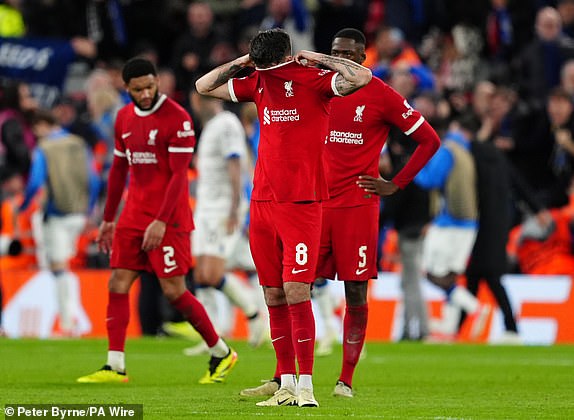 Liverpool's Dominik Szoboszlai appears dejected after Atalanta's Mario Pasalic scores their third goal of the game during the UEFA Europa League quarter-final, first leg match at Anfield, Liverpool. Picture date: Thursday April 11, 2024. PA Photo. See PA story SOCCER Liverpool. Photo credit should read: Peter Byrne/PA Wire. RESTRICTIONS: Use subject to restrictions. Editorial use only, no commercial use without prior consent from rights holder.