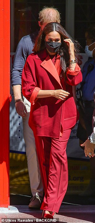Jennifer also pencilled the colourful magenta outfit that the mother-of-two sported during a visit to Harlem's PS 123 Mahalia Jackson school, where 94 per cent of the pupil's have free school meals