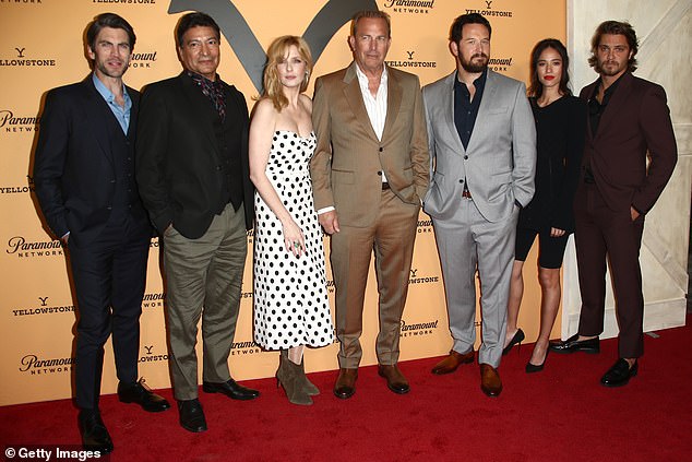 Costner (M) pictured alongside Wes Bentley, Gil Birmingham, Reilly, Cole Hauser, Kelsey Asbille and Luke Grimes at the season two premiere party for Yellowstone in 2019