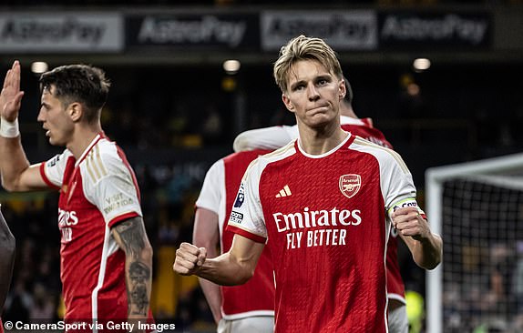 WOLVERHAMPTON, ENGLAND - APRIL 20: Arsenal's Martin Odegaard celebrates scoring his side's second goal during the Premier League match between Wolverhampton Wanderers and Arsenal FC at Molineux on April 20, 2024 in Wolverhampton, England.(Photo by Andrew Kearns - CameraSport via Getty Images)