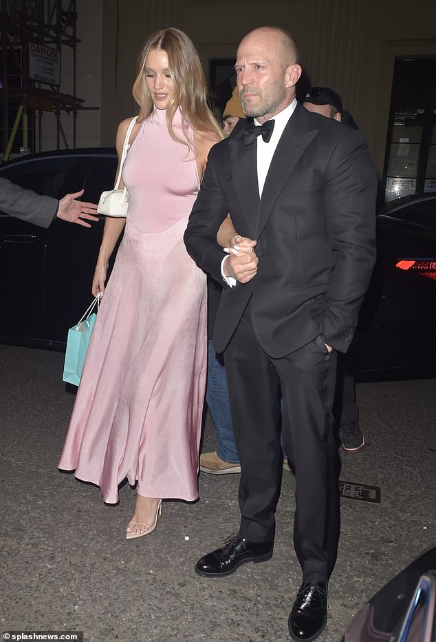 he was joined at the venue by actor fiancé Jason Statham, who looked dapper in a tuxedo