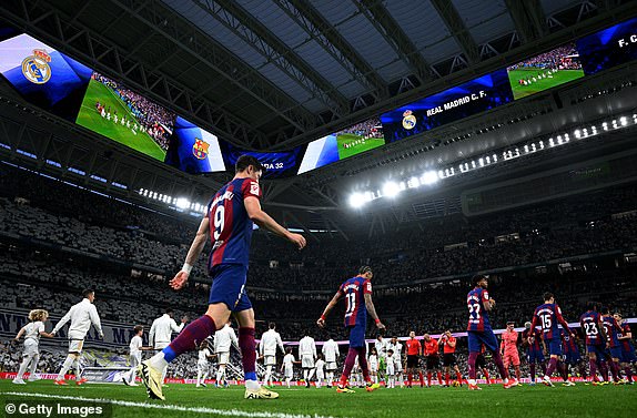 MADRID, SPAIN - APRIL 21: Robert Lewandowski of FC Barcelona takes to the field prior to kick-off ahead of the LaLiga EA Sports match between Real Madrid CF and FC Barcelona at Estadio Santiago Bernabeu on April 21, 2024 in Madrid, Spain. (Photo by David Ramos/Getty Images) (Photo by David Ramos/Getty Images)
