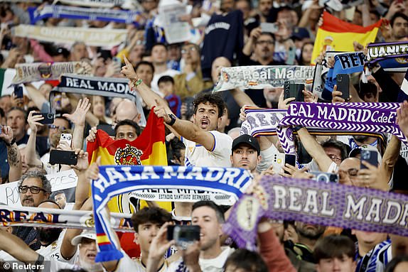 Soccer Football - LaLiga - Real Madrid v FC Barcelona - Santiago Bernabeu, Madrid, Spain - April 21, 2024 Real Madrid fans react in the stands before the match REUTERS/Juan Medina