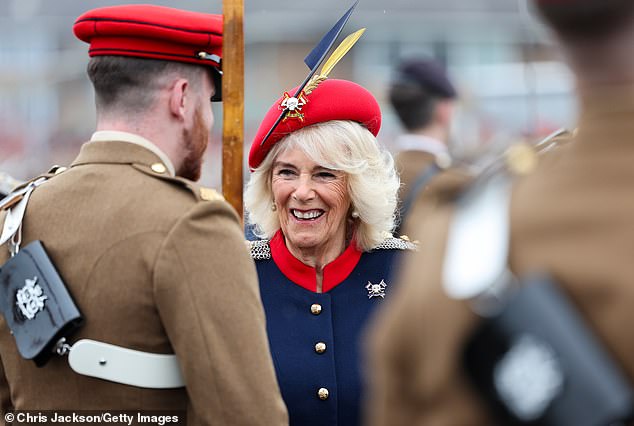 Queen Camilla looked effortlessly chic today as she undertook her first visit as Colonel-in-Cheif of the Royal Lancers